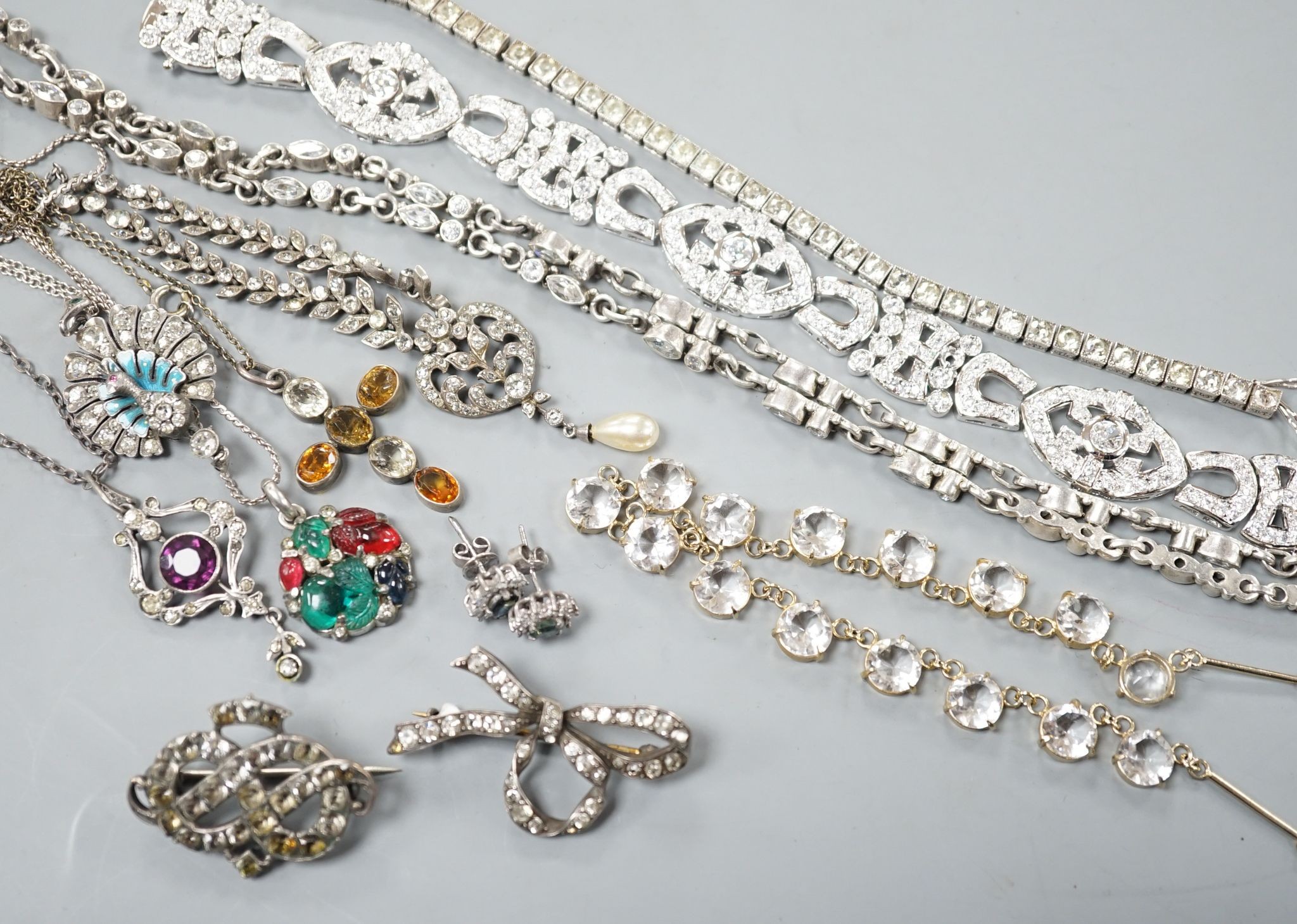 A small quantity of assorted paste set costume jewellery.